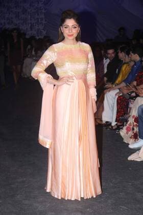 MUMBAI, INDIA - MARCH 29: Bollywood singer Kanika Kapoor during the opening show of Lakme Fashion Week Summer Resort 2016, at Mehboob Studio, Bandra on March 29, 2016 in Mumbai, India. (Photo by Pramod Thakur Hindustan Times ) Lakme Fashion Week Summer Resort 2016