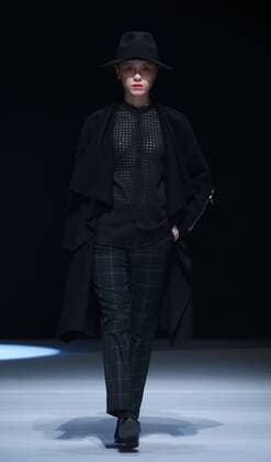 BEIJING, CHINA - MARCH 31: (CHINA OUT) A model showcases designs on the runway at Henry Herbert Liu Yong Private Custom Collection during the Mercedes-Benz China Fashion Week Autumn Winter 2016 2017 at 751D.Park on March 31, 2016 in Beijing, China.  CFP481994456