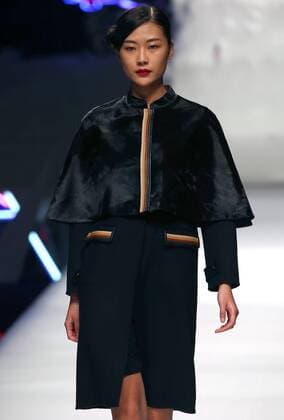 Models showcase fashion designs by Zoual Yanti during China s fashion week in Beijing on March 31, 2016. Chinese fashion designers are becoming an international force with both European and American fashion houses looking at the new, fresh Chinese clothing-minds as potential partners in future clothing brands.  PEK2016033125 STEPHENxSHAVER