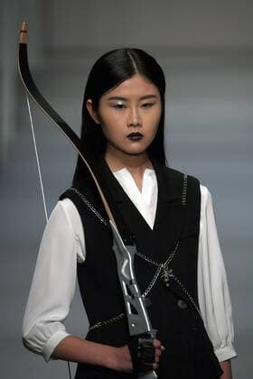 Models showcase fashion designs by Zoual Yanti during China s fashion week in Beijing on March 31, 2016. Chinese fashion designers are becoming an international force with both European and American fashion houses looking at the new, fresh Chinese clothing-minds as potential partners in future clothing brands.  PEK2016033136 STEPHENxSHAVER
