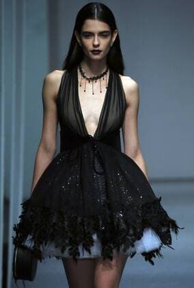 Models showcase fashion designs by Zoual Yanti during China s fashion week in Beijing on March 31, 2016. Chinese fashion designers are becoming an international force with both European and American fashion houses looking at the new, fresh Chinese clothing-minds as potential partners in future clothing brands.  PEK2016033154 STEPHENxSHAVER