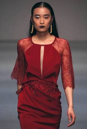Models showcase fashion designs by Zoual Yanti during China s fashion week in Beijing on March 31, 2016. Chinese fashion designers are becoming an international force with both European and American fashion houses looking at the new, fresh Chinese clothing-minds as potential partners in future clothing brands.  PEK2016033156 STEPHENxSHAVER