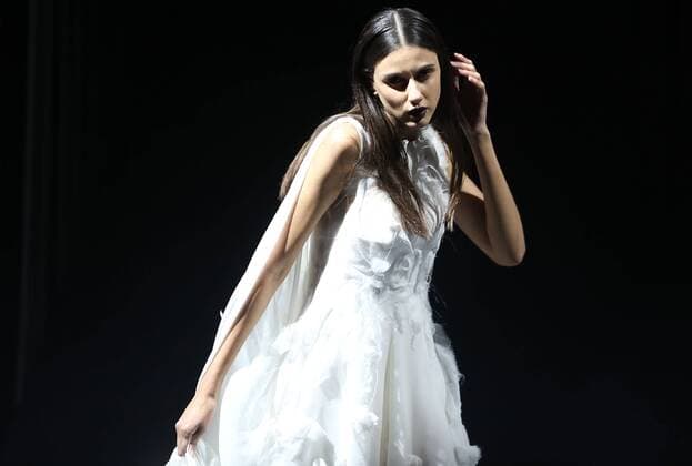 Models showcase fashion designs by Zoual Yanti during China s fashion week in Beijing on March 31, 2016. Chinese fashion designers are becoming an international force with both European and American fashion houses looking at the new, fresh Chinese clothing-minds as potential partners in future clothing brands.  PEK2016033104 STEPHENxSHAVER