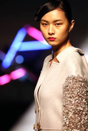 Models showcase fashion designs by Zoual Yanti during China s fashion week in Beijing on March 31, 2016. Chinese fashion designers are becoming an international force with both European and American fashion houses looking at the new, fresh Chinese clothing-minds as potential partners in future clothing brands.  PEK2016033110 STEPHENxSHAVER