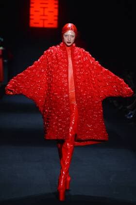 BEIJING, CHINA - MARCH 31: (CHINA OUT) A model showcases designs on the runway at Sheguang Hu Collection during the Mercedes-Benz China Fashion Week Autumn Winter 2016 2017 at 751D.Park on March 31, 2016 in Beijing, China.  CFP481980263