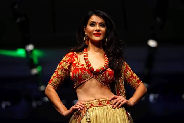 Former Miss Nepal Shristi Shrestha walks on the stage during the last day of TGIF Nepal Fashion week in Kathmandu, Nepal, April 2, 2016. The four-day fashion week presented both domestic and foreign designers creations. ) NEPAL-KATHMANDU-TGIF FASHION WEEK SunilxSharma 