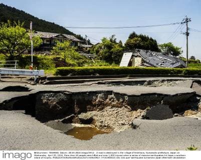 A road is destroyed in the village of Nishihara, Kumamoto prefecture, Japan on Wednesday, April 20, 2016. More than 40 people were killed and over 1,000 injured when a series of massive earthquakes hit Japan s southern island of Kyushu.  (YYJC000015)