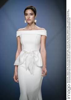 April 26, 2016 - Barcelona, Catalonia, Spain - A model walks the runway presenting a wedding dress of the Spring Summer 2017 collection during the Rosa Clara catwalk show at the Barcelona Bridal Fashion Week 2016 Barcelona Spain - ZUMAo105