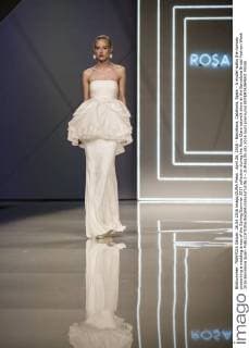 April 26, 2016 - Barcelona, Catalonia, Spain - A model walks the runway presenting a wedding dress of the Spring Summer 2017 collection during the Rosa Clara catwalk show at the Barcelona Bridal Fashion Week 2016 Barcelona Spain - ZUMAo105