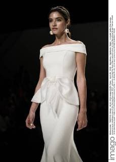 April 26, 2016 - Barcelona, Catalonia, Spain - A model walks the runway presenting a wedding dress of the Spring Summer 2017 collection during the Rosa Clara catwalk show at the Barcelona Bridal Fashion Week 2016 Barcelona Spain - ZUMAo105