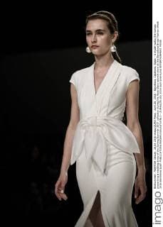 April 26, 2016 - Barcelona, Catalonia, Spain - A model walks the runway presenting a wedding dress of the Spring Summer 2017 collection during the Rosa Clara catwalk show at the Barcelona Bridal Fashion Week 2016 Barcelona Spain - ZUMAo105