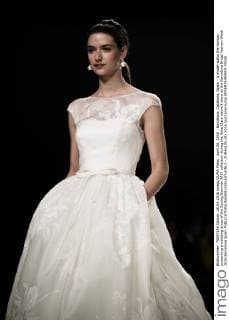 April 26, 2016 - Barcelona, Catalonia, Spain - A model walks the runway presenting a wedding dress of the Spring Summer 2017 collection during the Rosa Clara catwalk show at the Barcelona Bridal Fashion Week 2016 Barcelona Spain - ZUMAo105