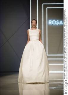 April 26, 2016 - Barcelona, Catalonia, Spain - A model walks the runway presenting a wedding dress of the Spring Summer 2017 collection during the Rosa Clara catwalk show at the Barcelona Bridal Fashion Week 2016 Barcelona Spain - ZUMAo105