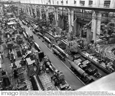 United States: c. 1934 Interior view of a factory that manufactures generator gears and parts for large turbines. Underwood Archives The Image Works xUnderwoodxArchives 1-Work-Fact-Mi_8