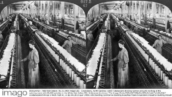 Greensboro, North Carolina: 1903 A stereocard showing women and girls working in the spinning room with 60,000 spindles in the White Oak Cotton Mill. Underwood Archives The Image Works xUnderwoodxArchives 1-Work-Fact-W_11
