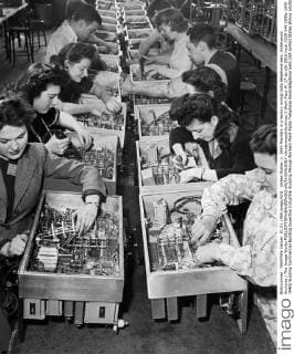 United States: c. 1940 Workers in a factory wiring radio telephone sets. Underwood Archives The Image Works xUnderwoodxArchives 1-Work-Fact-W_17