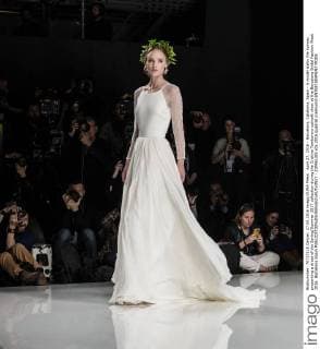 April 27, 2016 - Barcelona, Catalonia, Spain - A model walks the runway presenting a dress of the Spring Summer 2017 collection during the Cristina Tamborero catwalk show at the Barcelona Bridal Fashion Week 2016. Barcelona Spain - ZUMAo105