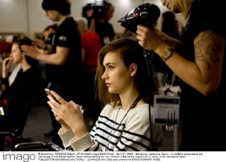 April 27, 2016 - Barcelona, Catalonia, Spain - A model is prepared at the backstage of the Bridal Fashion Week before leaving for the catwalk in Barcelona (Spain) on 27 April, 2016. Barcelona Spain  - ZUMAn230