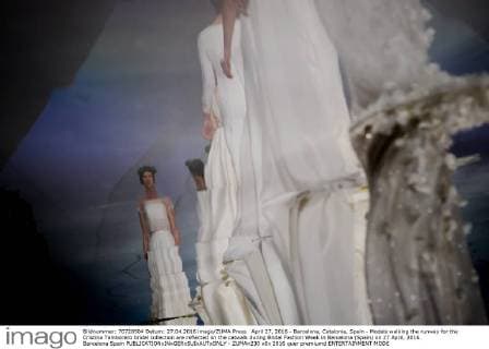 April 27, 2016 - Barcelona, Catalonia, Spain - Models walking the runway for the Cristina Tamborero bridal collection are reflected on the catwalk during Bridal Fashion Week in Barcelona (Spain) on 27 April, 2016. Barcelona Spain  - ZUMAn230