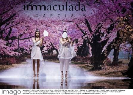 April 27, 2016 - Barcelona, Catalonia, Spain - Models walk the runway presenting a wedding dress of the Spring Summer 2017 collection during the Inmaculada Garcia catwalk show at the Barcelona Bridal Fashion Week 2016 Barcelona Spain - ZUMAo105