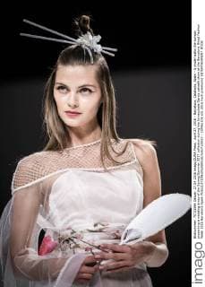 April 27, 2016 - Barcelona, Catalonia, Spain - A model walks the runway presenting a wedding dress of the Spring Summer 2017 collection during the Inmaculada Garcia catwalk show at the Barcelona Bridal Fashion Week 2016 Barcelona Spain - ZUMAo105