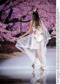 April 27, 2016 - Barcelona, Catalonia, Spain - A model walks the runway presenting a wedding dress of the Spring Summer 2017 collection during the Inmaculada Garcia catwalk show at the Barcelona Bridal Fashion Week 2016 Barcelona Spain - ZUMAo105