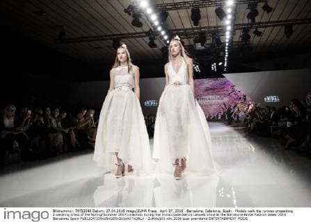 April 27, 2016 - Barcelona, Catalonia, Spain - Models walk the runway presenting a wedding dress of the Spring Summer 2017 collection during the Inmaculada Garcia catwalk show at the Barcelona Bridal Fashion Week 2016 Barcelona Spain - ZUMAo105