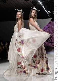 April 27, 2016 - Barcelona, Catalonia, Spain - Models walk the runway presenting a wedding dress of the Spring Summer 2017 collection during the Inmaculada Garcia catwalk show at the Barcelona Bridal Fashion Week 2016 Barcelona Spain - ZUMAo105