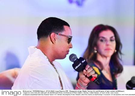 Reaggeton singer Daddy Yankee (L) and Director of latin content at Billboard magazine Leila Cobo (R) take part at the Billboard Music Conference in Miami Beach, Florida, United States, 27 April 2016. Latin music producers explained that the musical fusion will remain the engine of the industry and that thanks to technology innovation will be quicker and more successful. EFE Gaston de Cardenas MUSIC PRODUCERS AFFIRM THE ADVANCES OF TECHNOLOGY WIL WALLOW INNOVATION !ACHTUNG: NUR REDAKTIONELLE NUTZUNG!  MBE008 20160428-635974084385389658