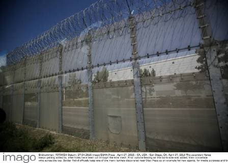 April 27, 2016 - CA, USA - San Diego, CA. April 27, 2016 The secondary fence keeps getting added to, after holes have been cut through the wire mesh. First cyclone fencing on the north side was added, then concertina wire across the top. Border Patrol officials keep one of the many tunnels discovered near Otay Mesa as an example for new agents, for media purposes and training operations. Known as the Galvez tunnel, it s an example of one of the more developed tunnels, having nearly twice the height of the recently discovered tunnels, with electrical wiring and rails for moving bundles under the border. Mandatory photo credit: USA - ZUMAs44_