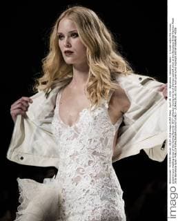April 28, 2016 - Barcelona, Catalonia, Spain - A model walks the runway presenting a wedding dress of the Spring Summer 2017 collection during the Jordi Dalmau catwalk show at the Barcelona Bridal Fashion Week 2016 Barcelona Spain - ZUMAo105
