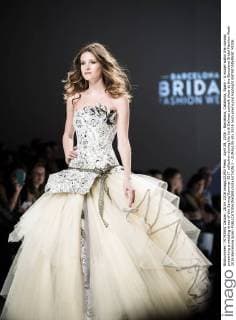 April 28, 2016 - Barcelona, Catalonia, Spain - A model walks the runway presenting a wedding dress of the Spring Summer 2017 collection during the Jordi Dalmau catwalk show at the Barcelona Bridal Fashion Week 2016 Barcelona Spain - ZUMAo105