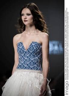 April 28, 2016 - Barcelona, Catalonia, Spain - A model walks the runway presenting a wedding dress of the Spring Summer 2017 collection during the Jordi Dalmau catwalk show at the Barcelona Bridal Fashion Week 2016 Barcelona Spain - ZUMAo105