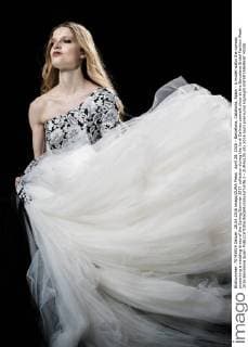 April 28, 2016 - Barcelona, Catalonia, Spain - A model walks the runway presenting a wedding dress of the Spring Summer 2017 collection during the Jordi Dalmau catwalk show at the Barcelona Bridal Fashion Week 2016 Barcelona Spain - ZUMAo105