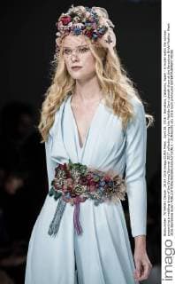 April 28, 2016 - Barcelona, Catalonia, Spain - A model walks the runway presenting a wedding dress of the Spring Summer 2017 collection during the Matilde Cano catwalk show at the Barcelona Bridal Fashion Week 2016 Barcelona Spain - ZUMAo105