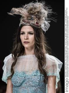 April 28, 2016 - Barcelona, Catalonia, Spain - A model walks the runway presenting a wedding dress of the Spring Summer 2017 collection during the Matilde Cano catwalk show at the Barcelona Bridal Fashion Week 2016 Barcelona Spain - ZUMAo105