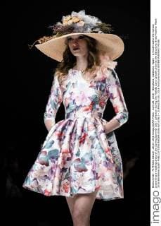 April 28, 2016 - Barcelona, Catalonia, Spain - A model walks the runway presenting a wedding dress of the Spring Summer 2017 collection during the Matilde Cano catwalk show at the Barcelona Bridal Fashion Week 2016 Barcelona Spain - ZUMAo105