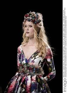 April 28, 2016 - Barcelona, Catalonia, Spain - A model walks the runway presenting a wedding dress of the Spring Summer 2017 collection during the Matilde Cano catwalk show at the Barcelona Bridal Fashion Week 2016 Barcelona Spain - ZUMAo105