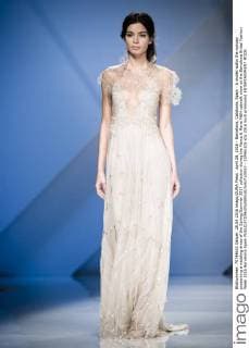 April 28, 2016 - Barcelona, Catalonia, Spain - A model walks the runway presenting a wedding dress of the Spring Summer 2017 collection during the Marco & Maria M&M catwalk show at the Barcelona Bridal Fashion Week 2016 Barcelona Spain - ZUMAo105
