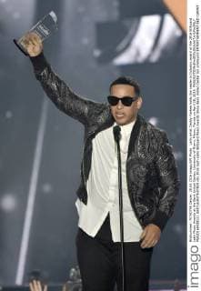 Latin artist Daddy Yankee holds the Leader in Industry award at the 2016 Billboard Latin Music Awards at the Bank United Center, University of Miami, Miami, Florida on April 28, 2016.  MIA20160428121 GARYxIxROTHSTEIN