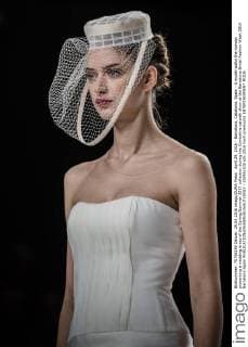 April 29, 2016 - Barcelona, Catalonia, Spain - A model walks the runway presenting a wedding dress of the Spring Summer 2017 collection during the Cymbeline catwalk show at the Barcelona Bridal Fashion Week 2016 Barcelona Spain - ZUMAo105