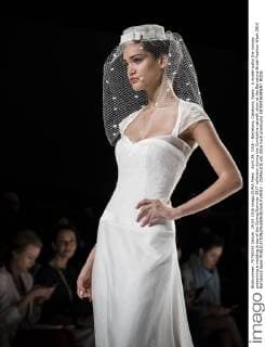 April 29, 2016 - Barcelona, Catalonia, Spain - A model walks the runway presenting a wedding dress of the Spring Summer 2017 collection during the Cymbeline catwalk show at the Barcelona Bridal Fashion Week 2016 Barcelona Spain - ZUMAo105