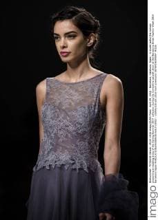 April 29, 2016 - Barcelona, Catalonia, Spain - A model walks the runway presenting a wedding dress of the Spring Summer 2017 collection during the Cymbeline catwalk show at the Barcelona Bridal Fashion Week 2016 Barcelona Spain - ZUMAo105