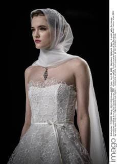 April 29, 2016 - Barcelona, Catalonia, Spain - A model walks the runway presenting a wedding dress of the Spring Summer 2017 collection during the Cymbeline catwalk show at the Barcelona Bridal Fashion Week 2016 Barcelona Spain - ZUMAo105