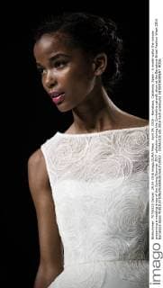 April 29, 2016 - Barcelona, Catalonia, Spain - A model walks the runway presenting a wedding dress of the Spring Summer 2017 collection during the Cymbeline catwalk show at the Barcelona Bridal Fashion Week 2016 Barcelona Spain - ZUMAo105