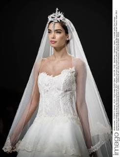 April 29, 2016 - Barcelona, Catalonia, Spain - A model walks the runway presenting a wedding dress of the Spring Summer 2017 collection during the Cymbeline catwalk show at the Barcelona Bridal Fashion Week 2016 Barcelona Spain - ZUMAo105