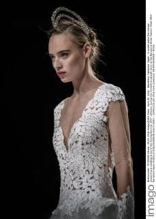 April 29, 2016 - Barcelona, Catalonia, Spain - A model walks the runway presenting a wedding dress of the Spring Summer 2017 collection during the Cymbeline catwalk show at the Barcelona Bridal Fashion Week 2016 Barcelona Spain - ZUMAo105