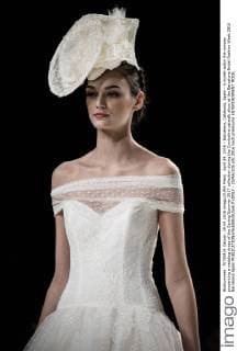 April 29, 2016 - Barcelona, Catalonia, Spain - A model walks the runway presenting a wedding dress of the Spring Summer 2017 collection during the Cymbeline catwalk show at the Barcelona Bridal Fashion Week 2016 Barcelona Spain - ZUMAo105