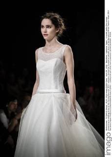 April 29, 2016 - Barcelona, Catalonia, Spain - A model walks the runway presenting a wedding dress of the Spring Summer 2017 collection during the Cymbeline catwalk show at the Barcelona Bridal Fashion Week 2016 Barcelona Spain - ZUMAo105