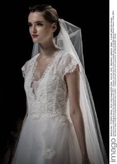 April 29, 2016 - Barcelona, Catalonia, Spain - A model walks the runway presenting a wedding dress of the Spring Summer 2017 collection during the Cymbeline catwalk show at the Barcelona Bridal Fashion Week 2016 Barcelona Spain - ZUMAo105
